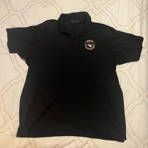 Devon and Jones black men’s 2XL polo 
Naval air training command Hook’20 logo